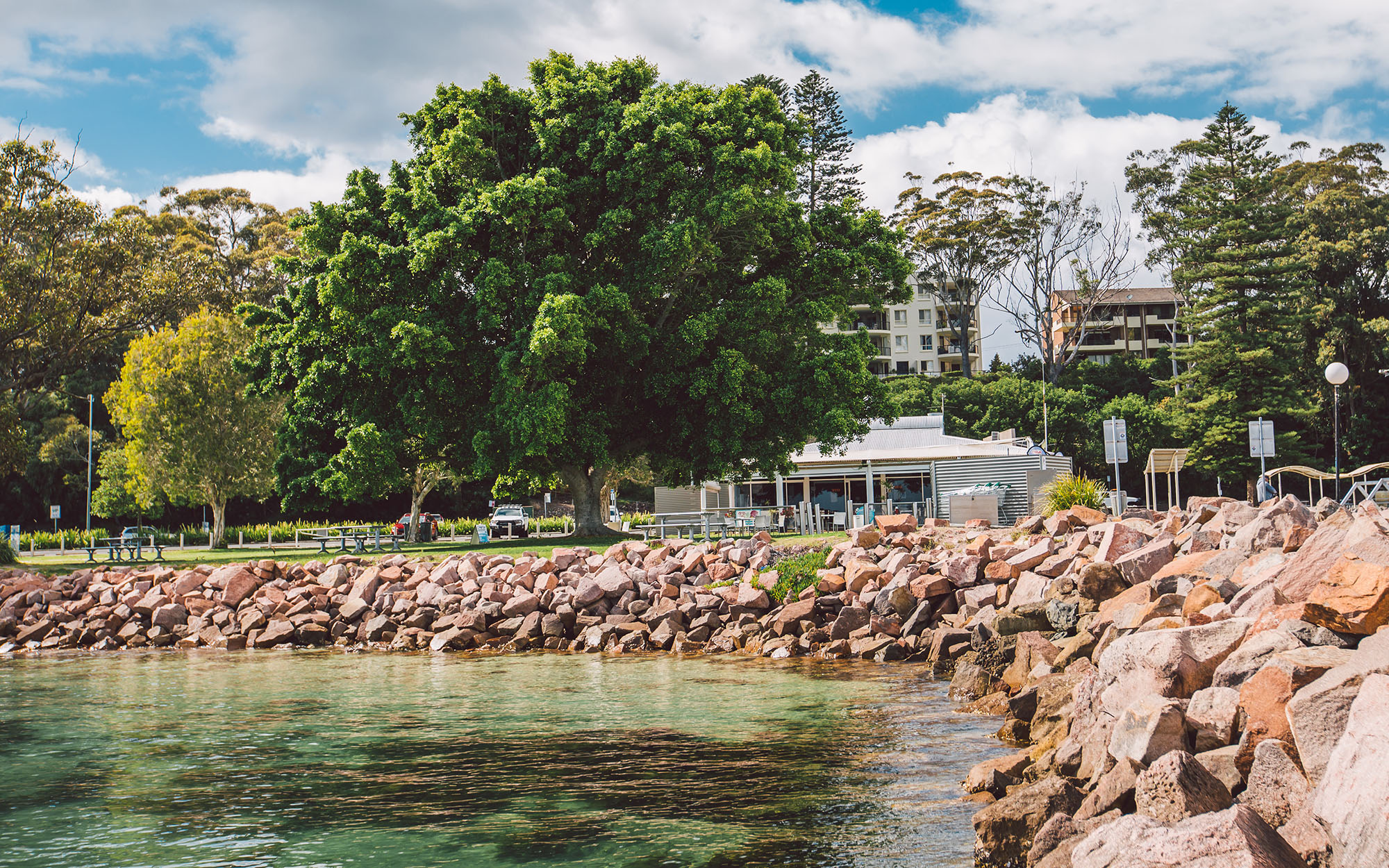 Shoreline and parklands outside Dolphin Watch Cafe, Nelsons Bay NSW