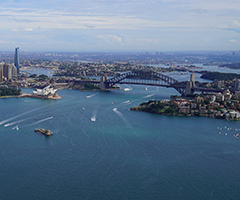 An iconic view of Sydney Harbour Bridge and the Opera house.
