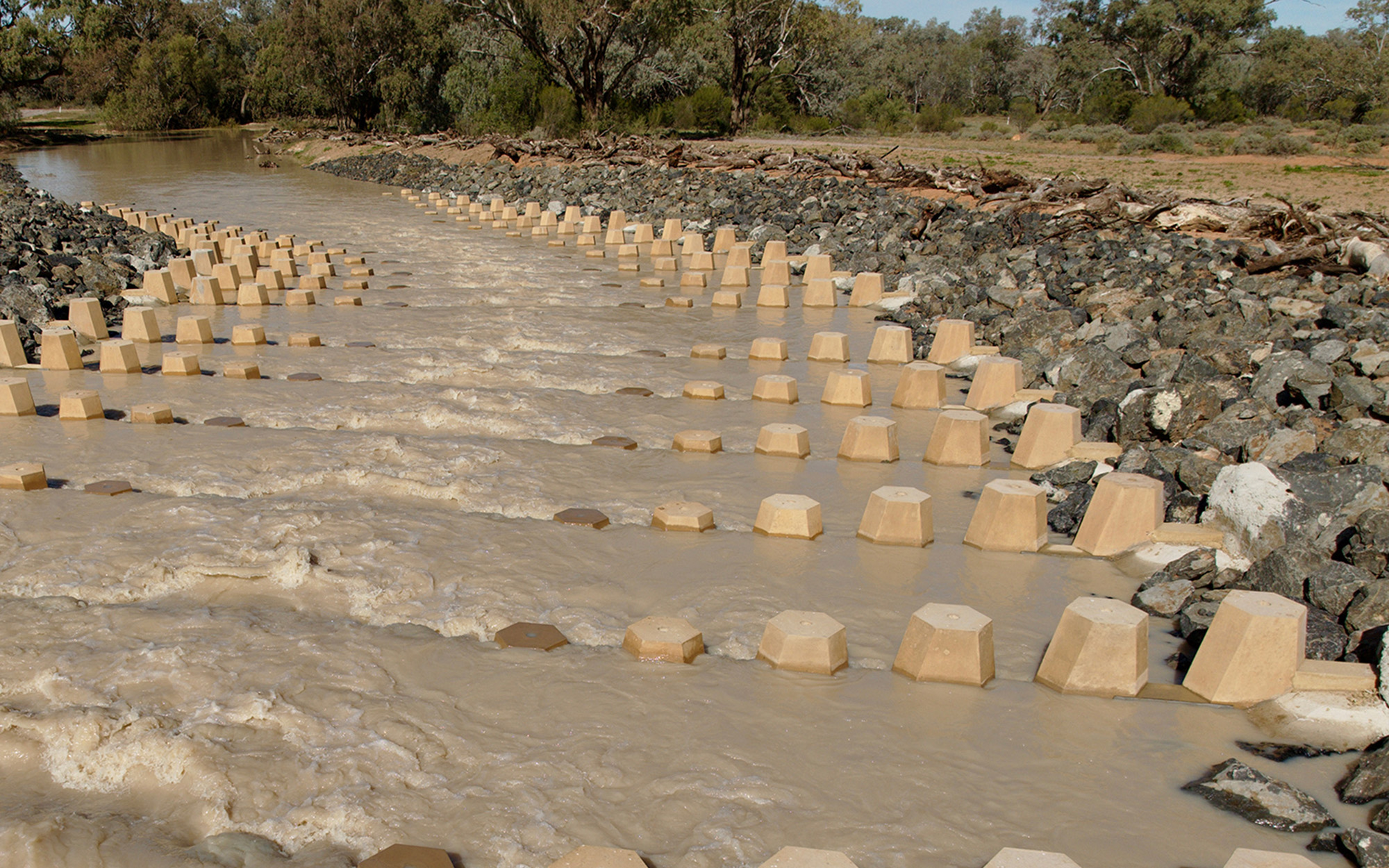 Baffled fishway made with rocks allowing movement of migratory native fish species.