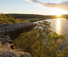 Sun setting over Hang Rock Lookout and the Shoalhaven River, in Nowra.